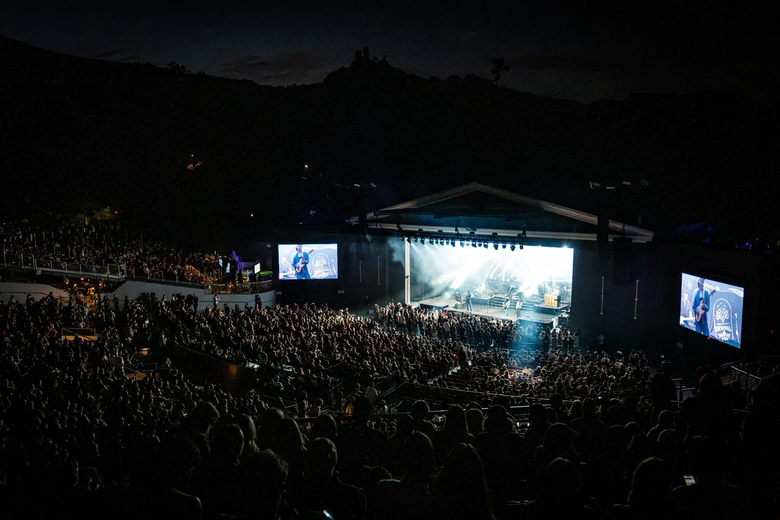 Jeremy Moyers performing during a large arena concert