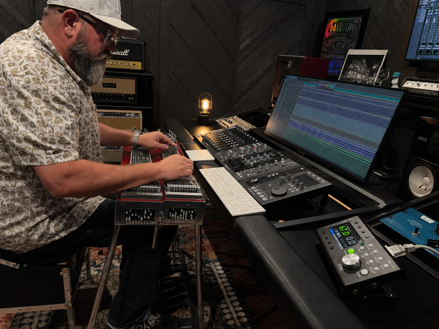 Jeremy Moyers tracking pedal steel in his studio