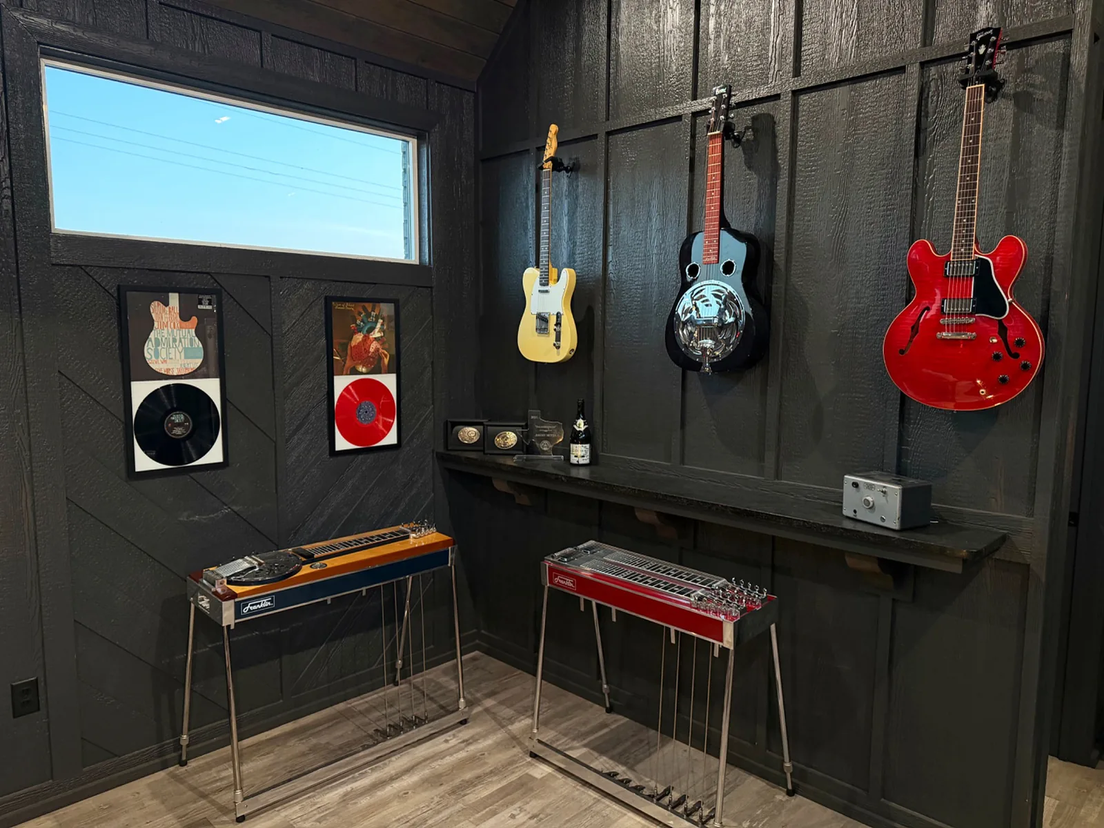 Instrument wall with vintage guitars, Dobro, Franklin Ped-A-Bro and pedal steel